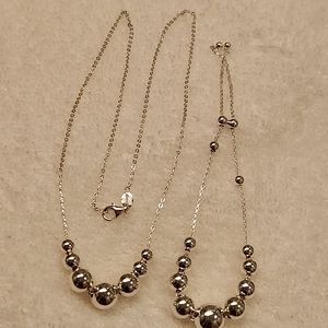 Super cute , 925 bright shiny Sterling Silver necklace & bracelet set..